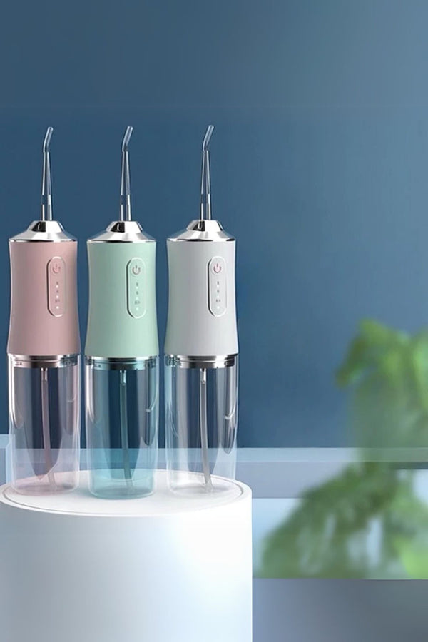 Portable Oral Irrigator Dental Flosser with 4 Nozzles — Fitness & Health, Arvani Home Essentials
