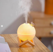 330ml humidifier and diffuser shown on a desk with wooden stand