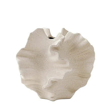 Minimalist Art Irregular Decoration White Shell Shape Matte Clay Ceramic Vase shown from another angle (Ceramic)