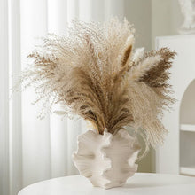 Minimalist Art Irregular Decoration White Shell Shape Matte Clay Ceramic Vase shown from another angle (Ceramic)