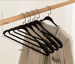 New Arc-Shaped Thickened Clothes Hanger – 10PC Set shown from another angle (Black & Cream)