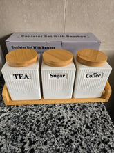 3pc Ceramic Canister Set with Bamboo Lids Tray shown from another angle (Ceramic, Bamboo)