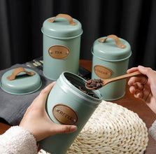 Sugar, Tea, Coffee canisters shown from another angle (Dinnerware)