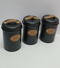 Sugar, Tea, Coffee canisters shown from another angle (Dinnerware)
