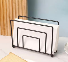 Modern minimalist style metallic serviettes holder shown from another angle (black, Gold)